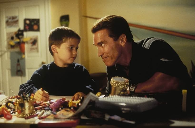 39 Best Classic Christmas Movies to Watch This Holiday Season 24 Jingle All the Way Movie Poster